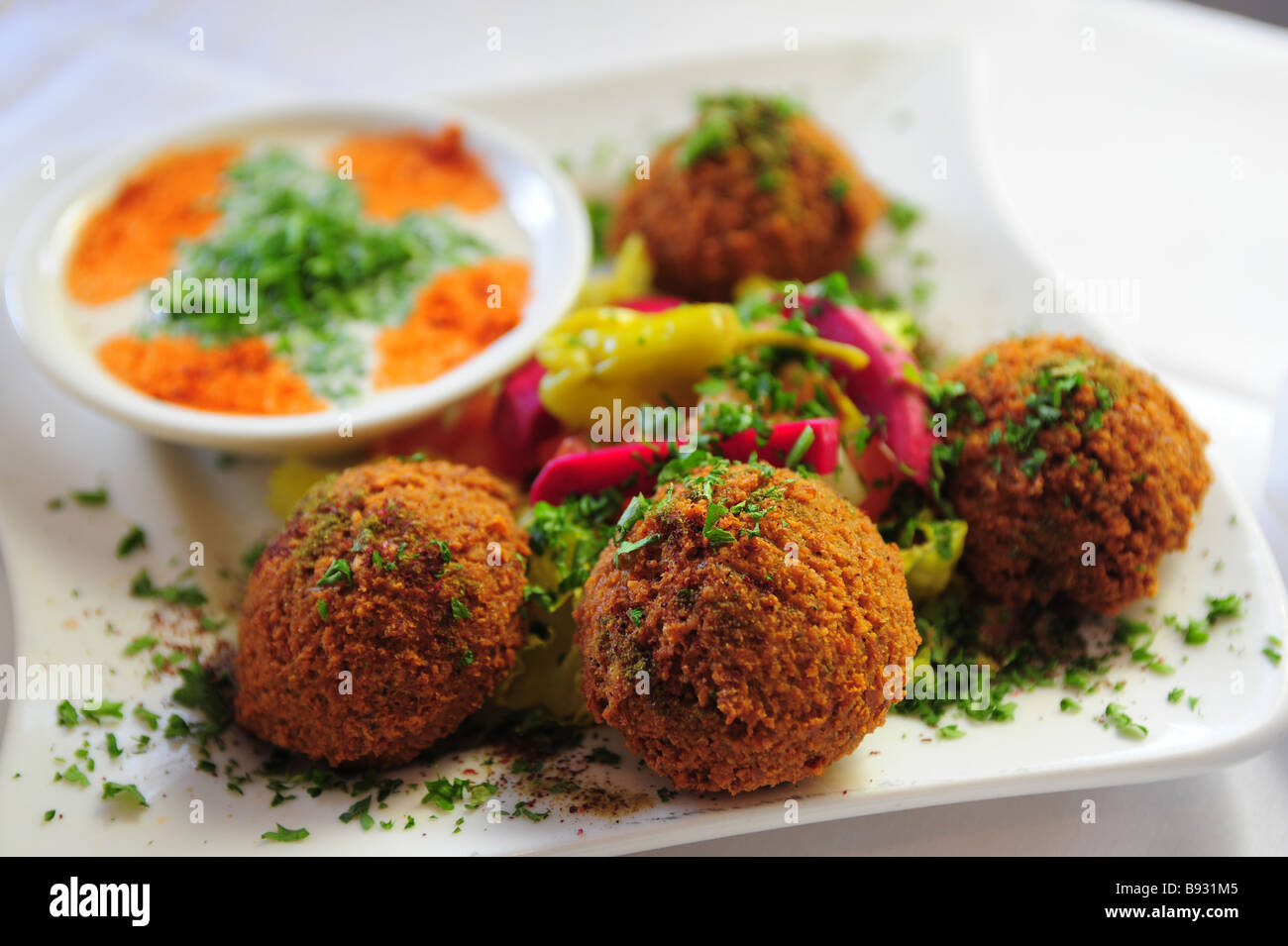 Falafel and tahini dipping sauce Middle East foods Stock Photo