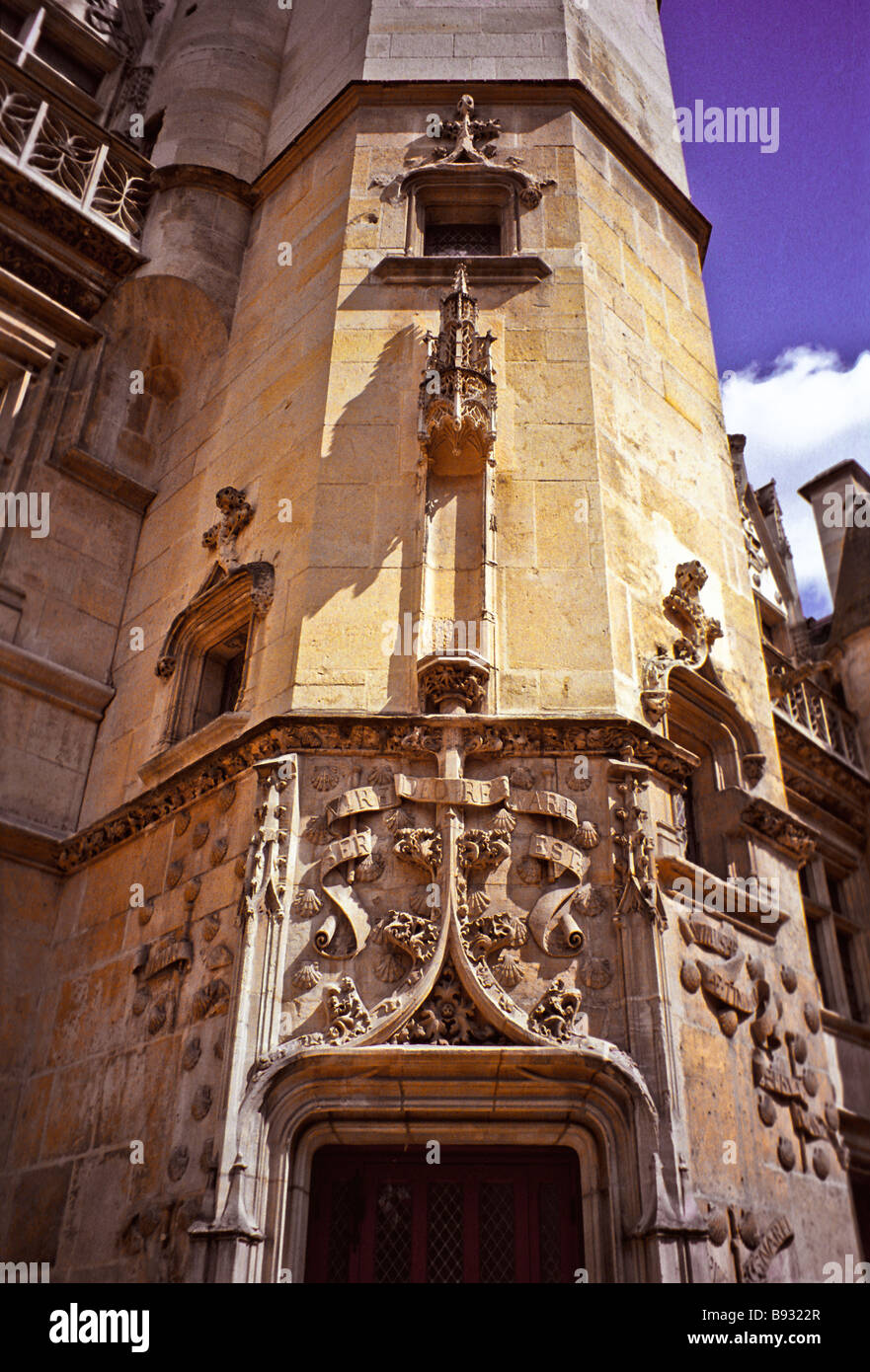 An ornate coat of arms decorates the entrance to the former 15th century Cluny Abbey in Paris now the Cluny Museum of the Middle Stock Photo