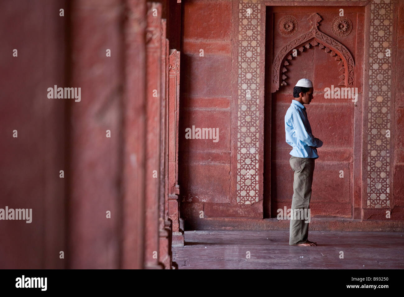 Muslim Man Praying Inside the Friday Mosque in Fatehpur Sikri India Stock Photo