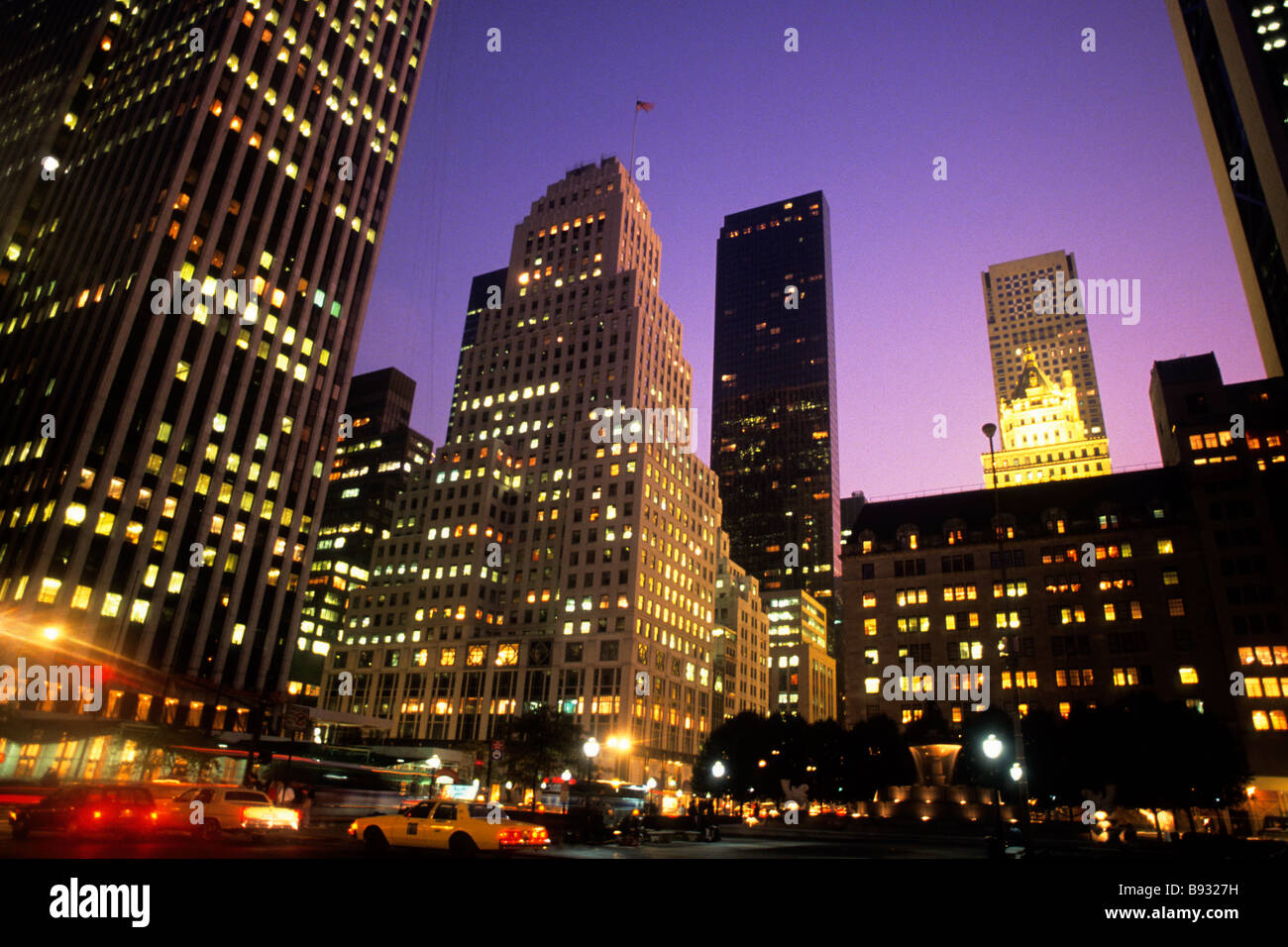 Night New York City Fifth Avenue urban skyline Midtown Manhattan Office buildings  Trump Tower, Bergdorf Goodman. Grand Army Plaza. Lights. USA Stock Photo