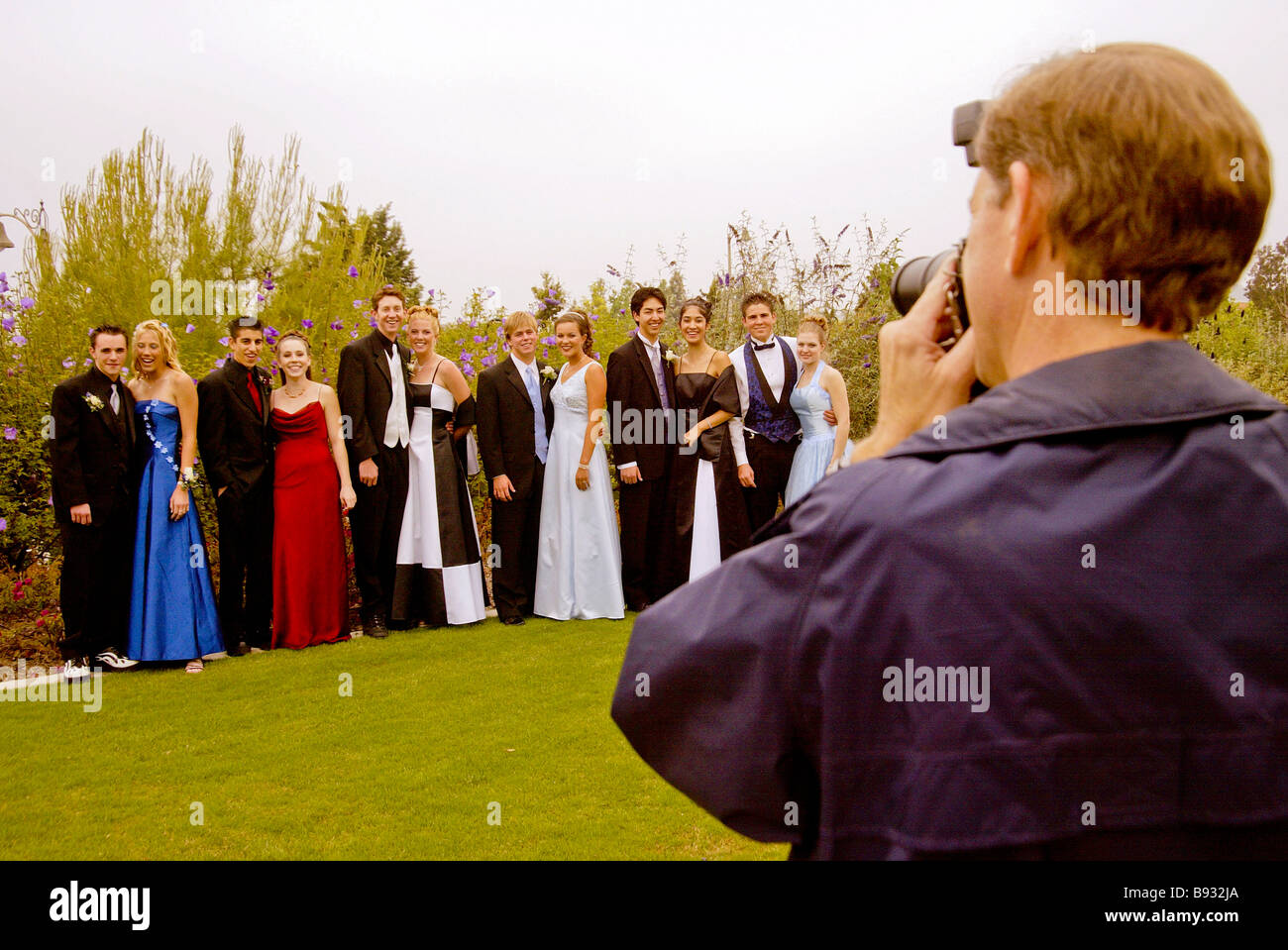 Graduating high school seniors pose for pictures in Rancho Santa Margarita CA. Stock Photo