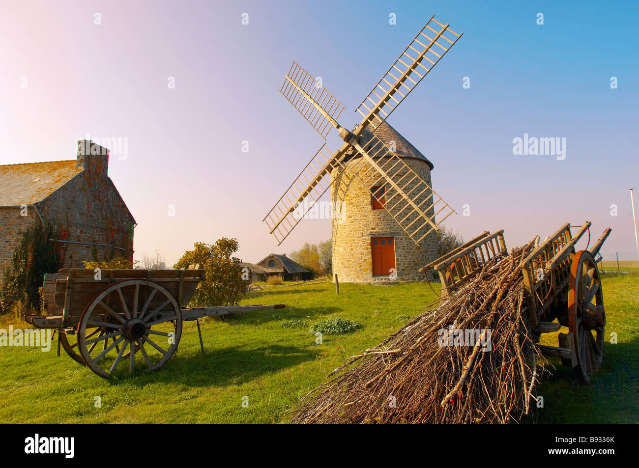 Traditional Brittany Windmill on the coast near Cancale France Stock Photo