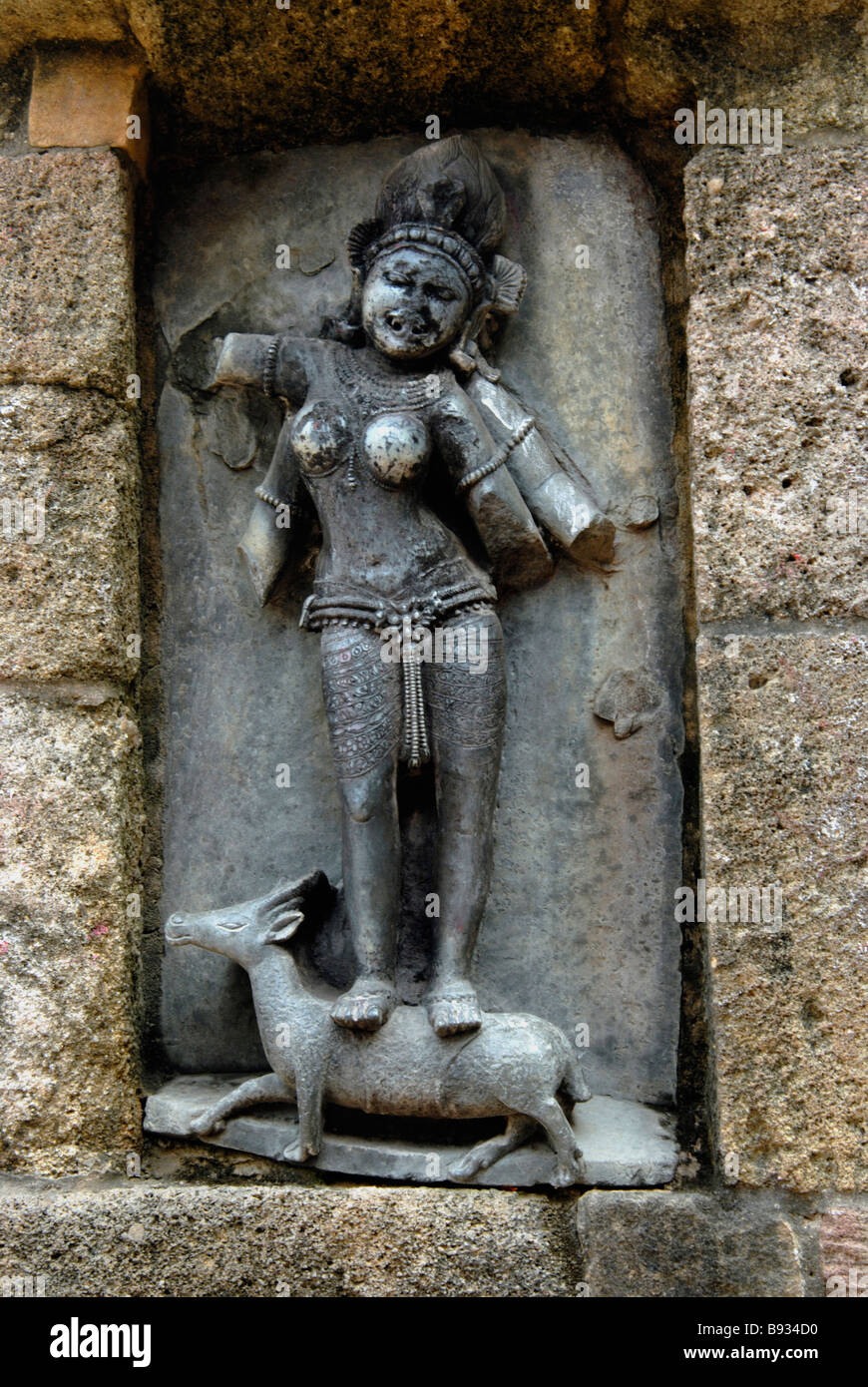 Yogini Temple, Hirapur, Yogini No.62  Vayu Veaeena. Four armed figure with a dancing pose. Braid of hair. Standing on a stag. Stock Photo