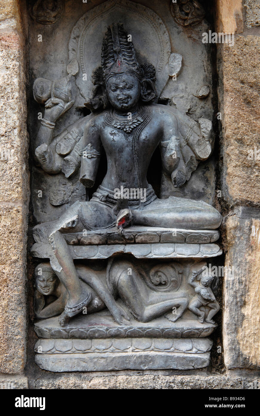 Yogini Temple, Bhairav - A ten armed male figure, sitting in a viswapadmasana pose. Hirapur Orissa, India. Stock Photo