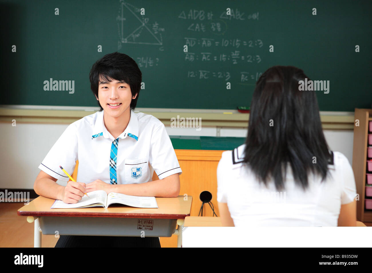 Two teenagers classroom happy hi-res stock photography and images - Alamy