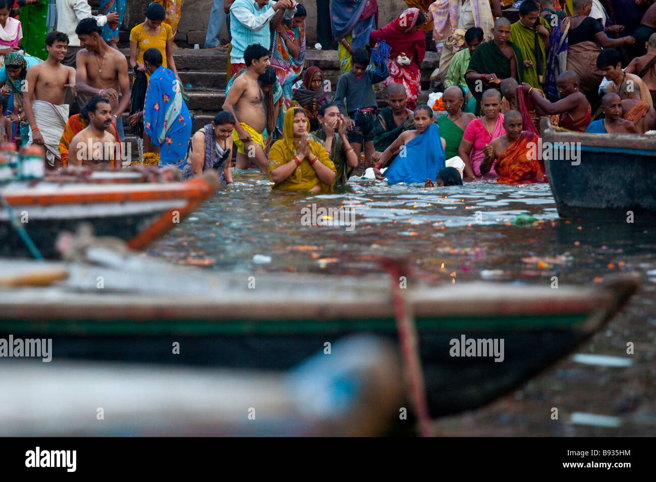 Bathing in the Ganges River in Varanasi India Stock Photo