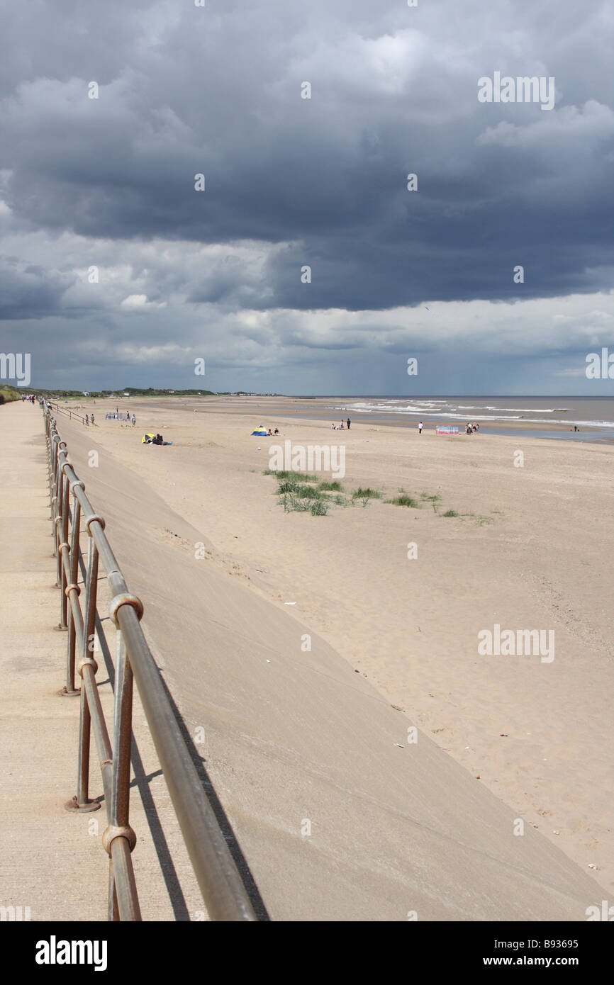 Storm clouds over a beach in Lincolnshire, England, U.K. Stock Photo