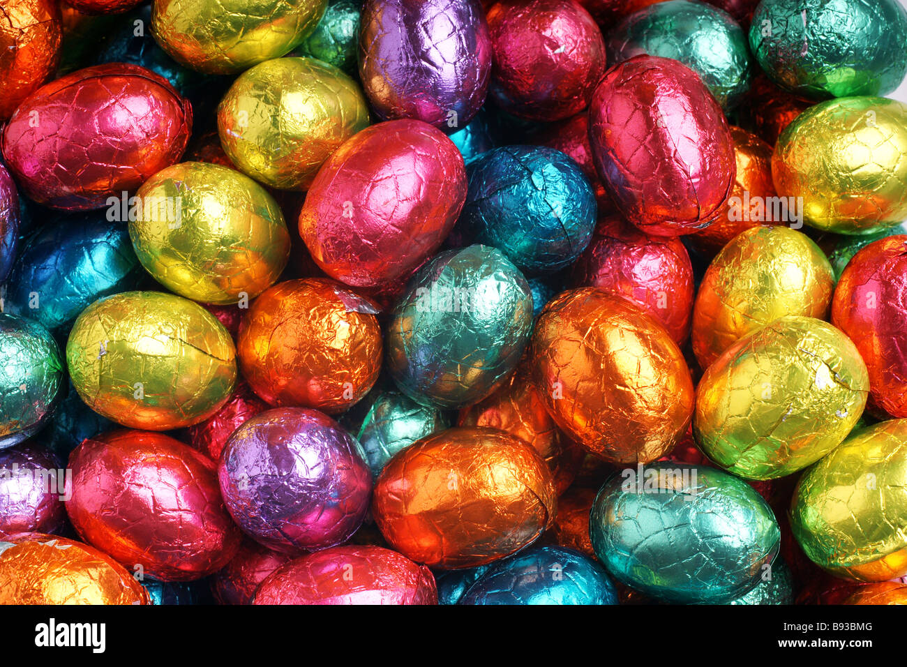 Close up background of colorful chocolate eggs in foil Stock Photo - Alamy