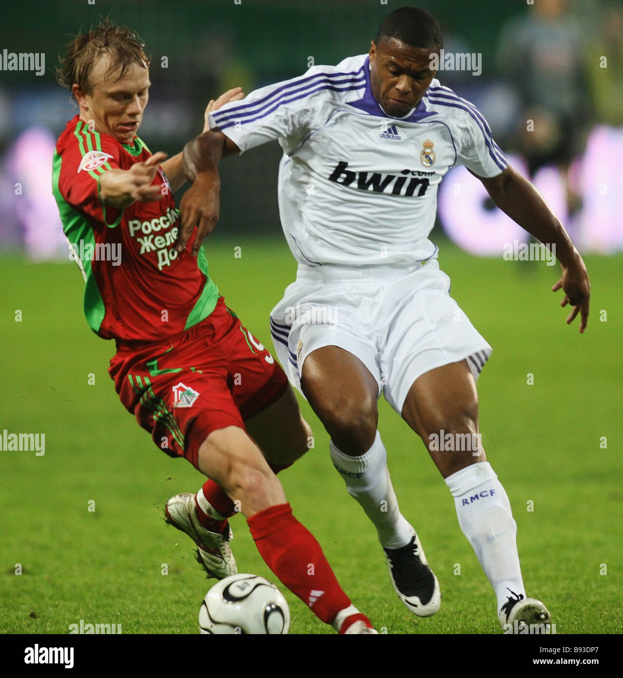 Lokomotiv halfback Renat Yanbayev left and Real attacker Brazilian 