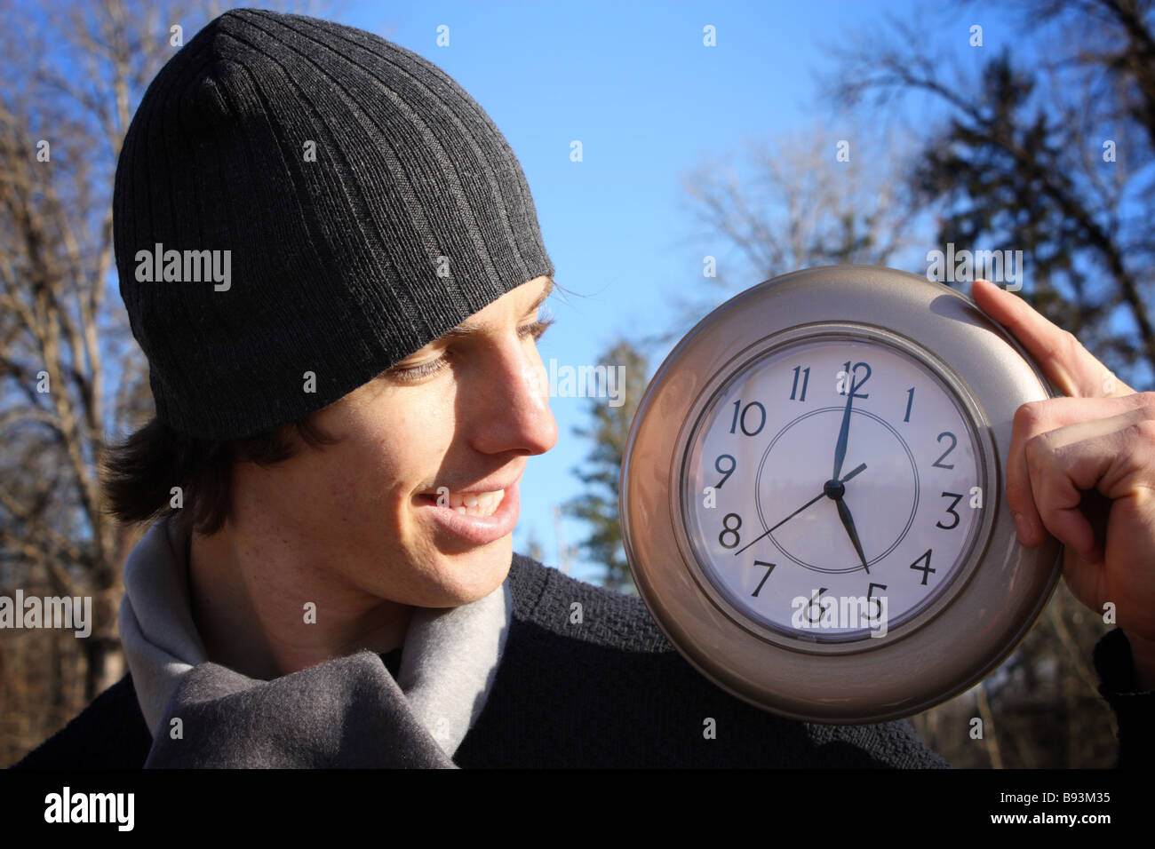 Man Looking At Clock Stock Photo - Alamy