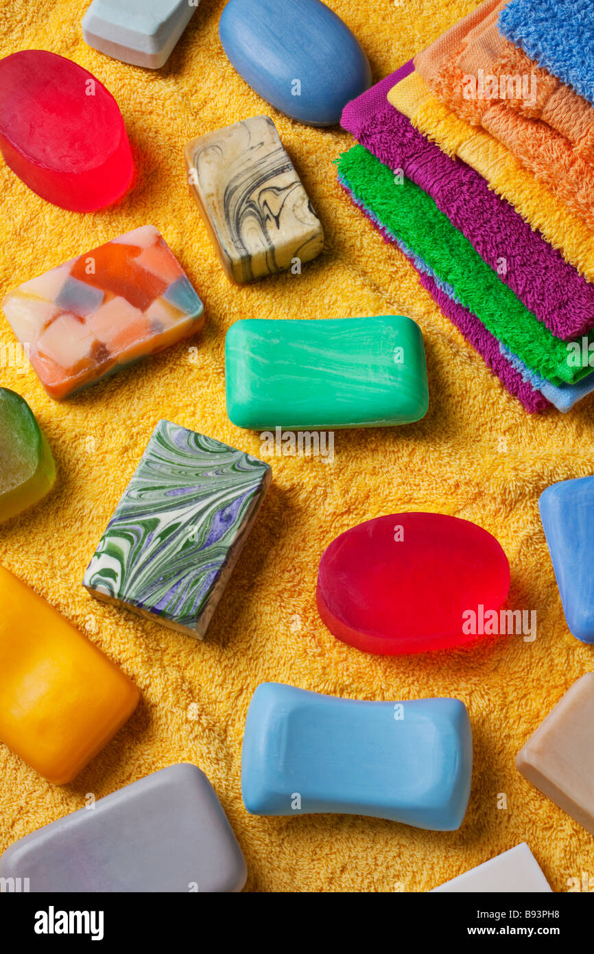 Assorted bars of soap on towel Stock Photo Alamy