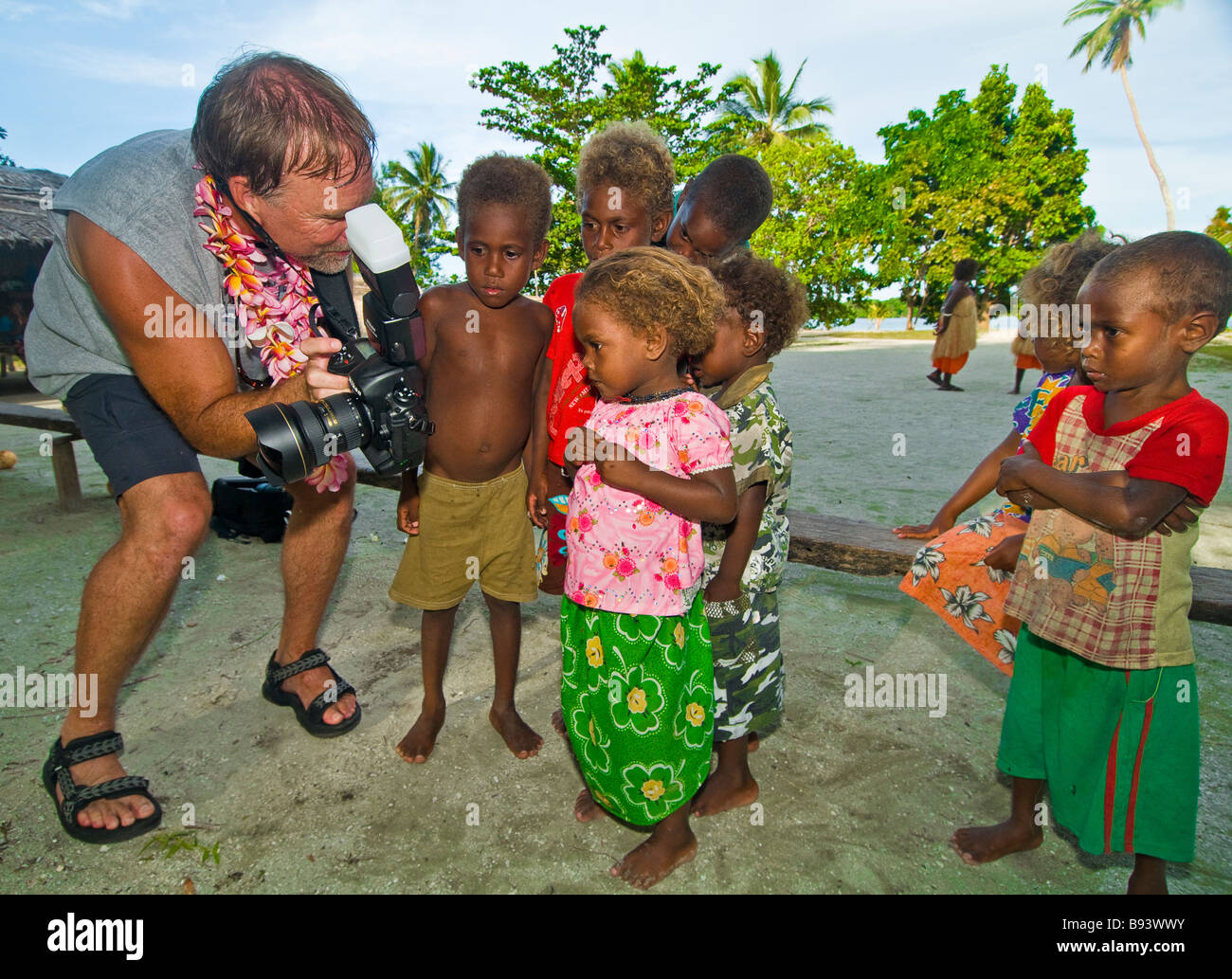 Photographer and Salomon Children Solomon Islands Stock Photo