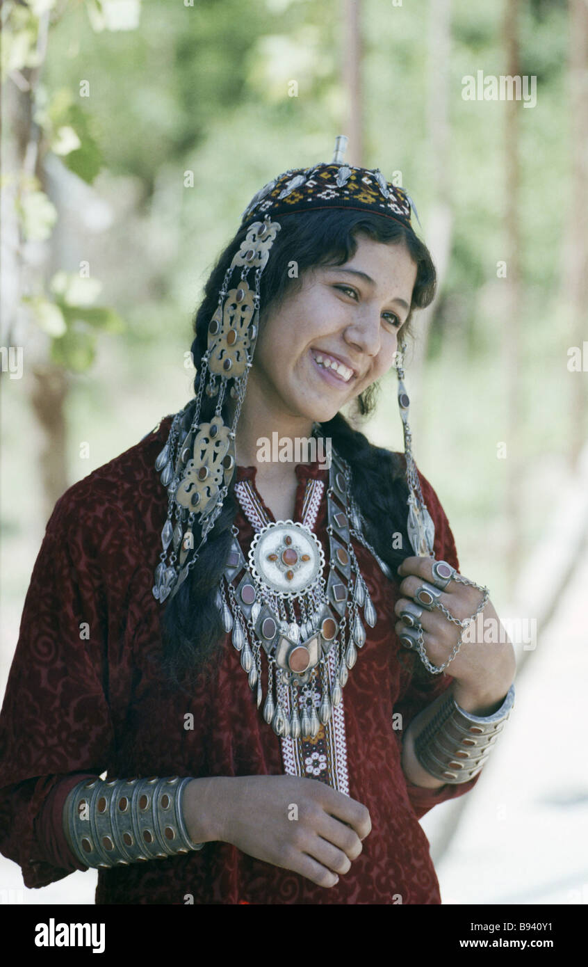 Turkmen girl wearing national clothes Stock Photo - Alamy
