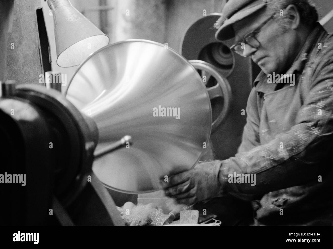 Pressman at Leningrad based wind instruments factory Stock Photo Alamy