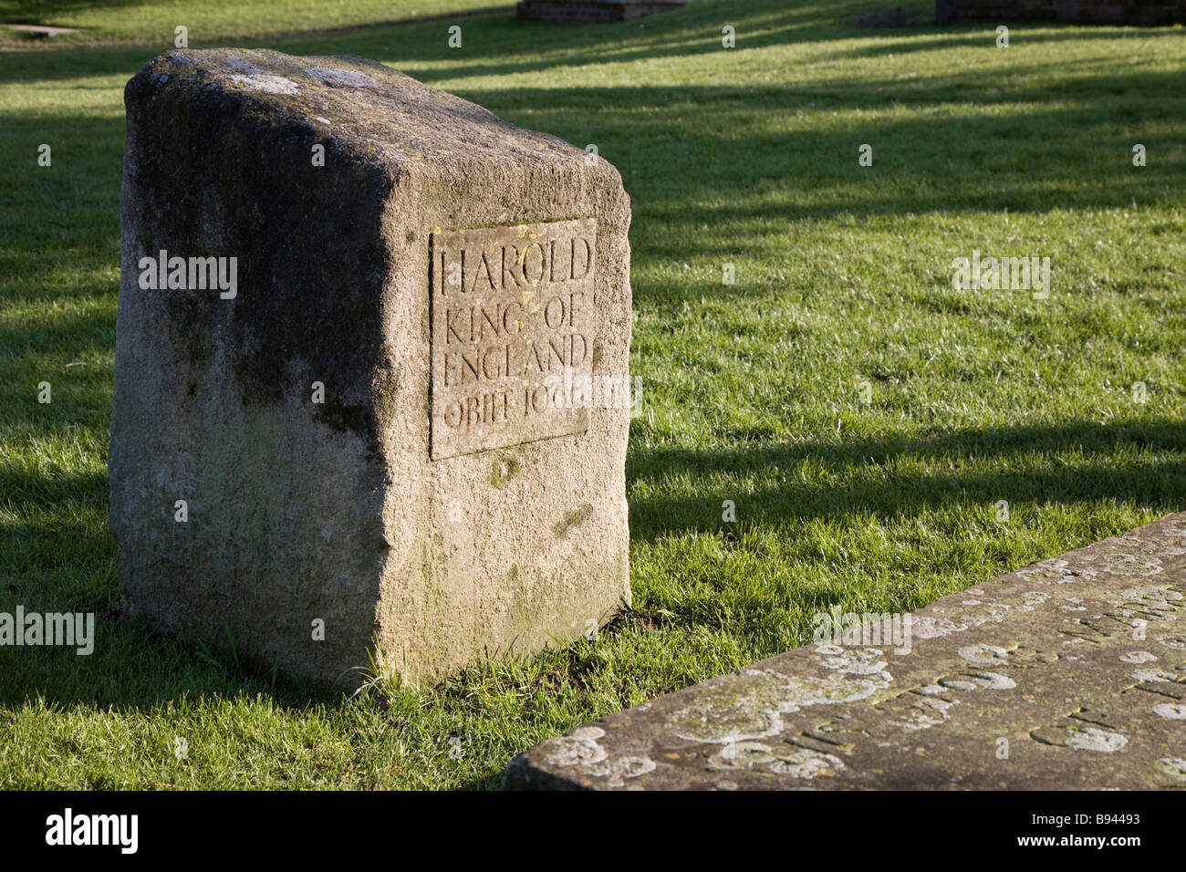Inscribed marker stone where King Harold of England is believed to be buried. Waltham Abbey, Essex, England. Stock Photo