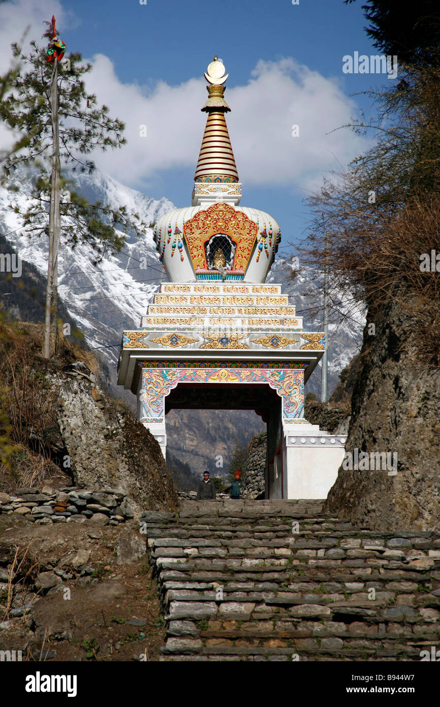 Buddhist stupa at the entrance of village on the trail Stock Photo - Alamy