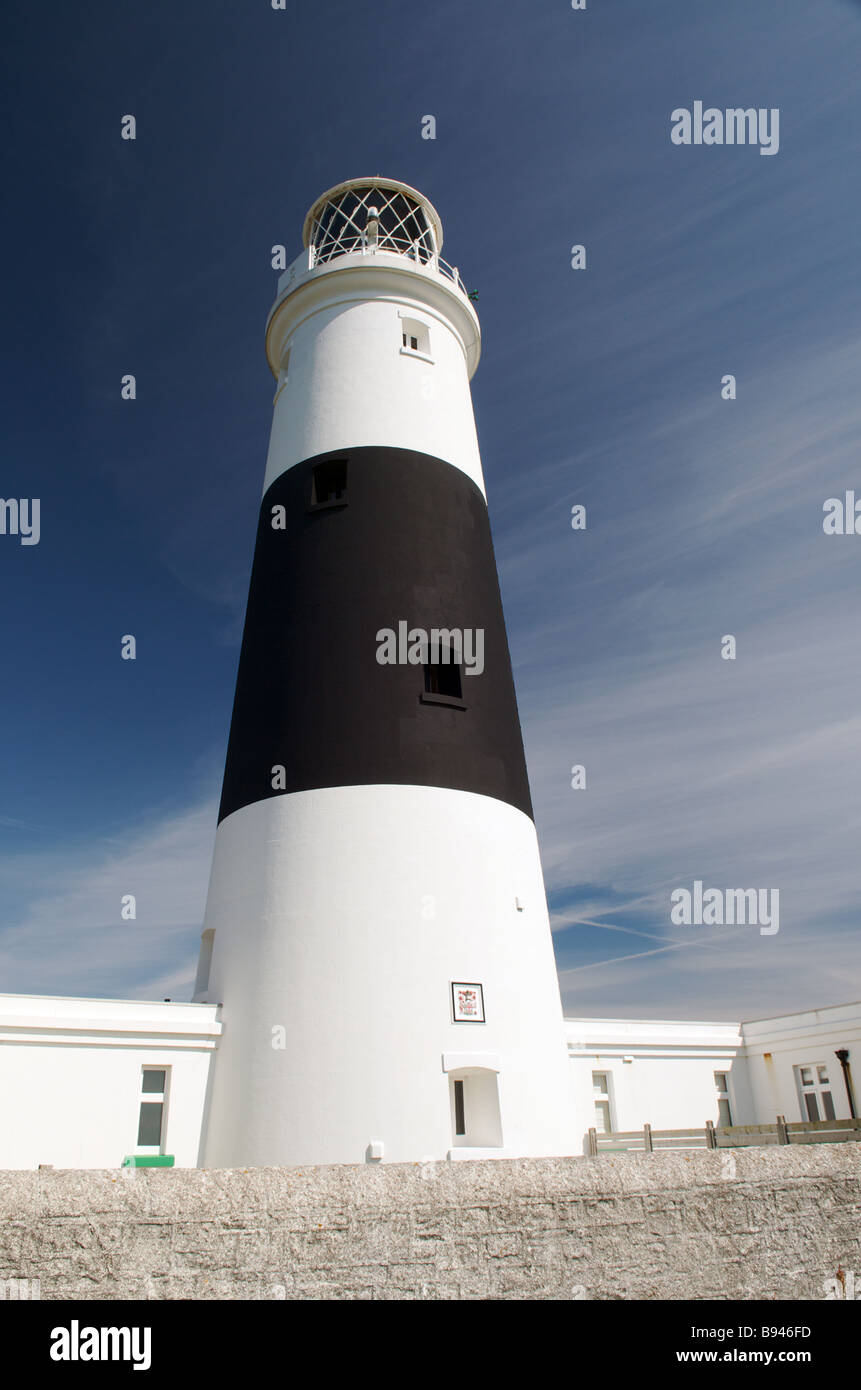 A portrait of Mannez lighthouse in Alderney on a clear sunny day Stock Photo