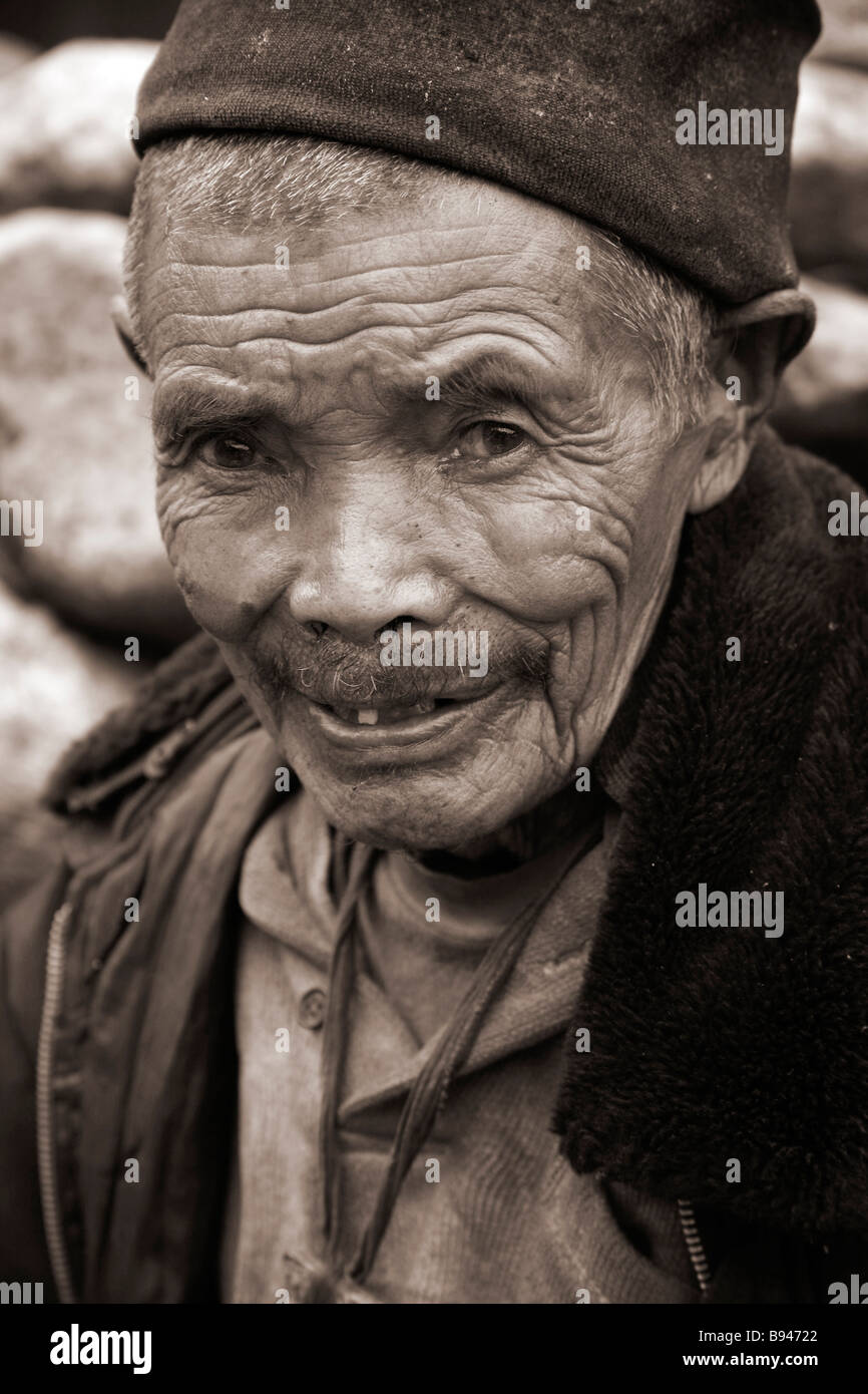 Annapurna Nepal 20 March 2008 Portrait of poor 79 year old man in his village on the trek Stock Photo