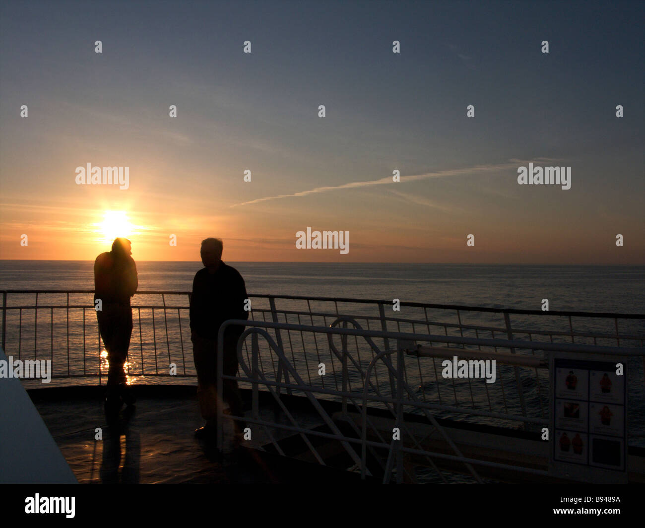 People enjoying the sunset from the rear viewing platform of the Oscar ...