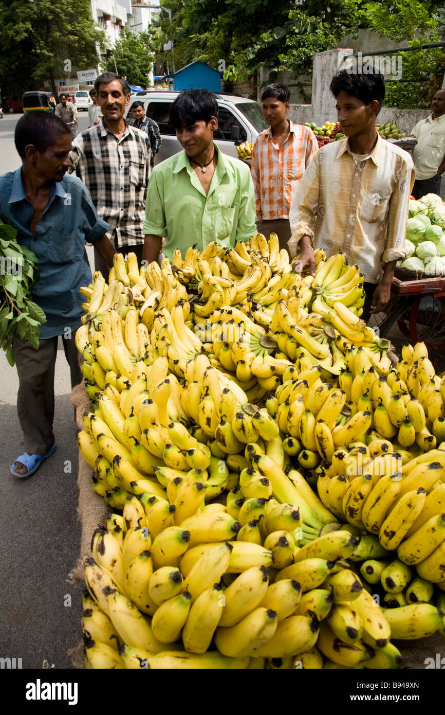Street market seller with his top quality fresh bananas. Street market stall, Surat, Gujarat. India. Stock Photo