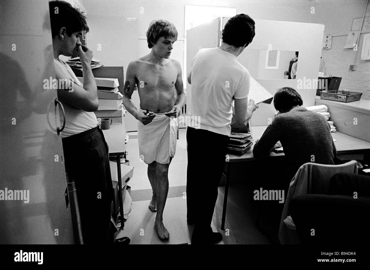 Newly arrived prisoner collects his prison clothing having handed his