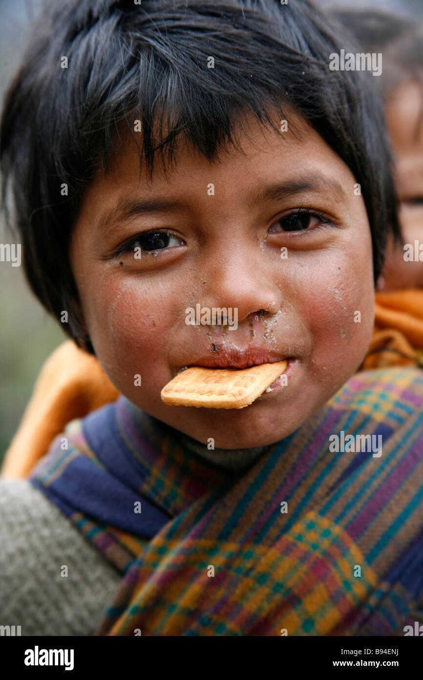 Annapurna Nepal 20 March 2008 Young boy asking trekkers for some sweets and biscuits Stock Photo
