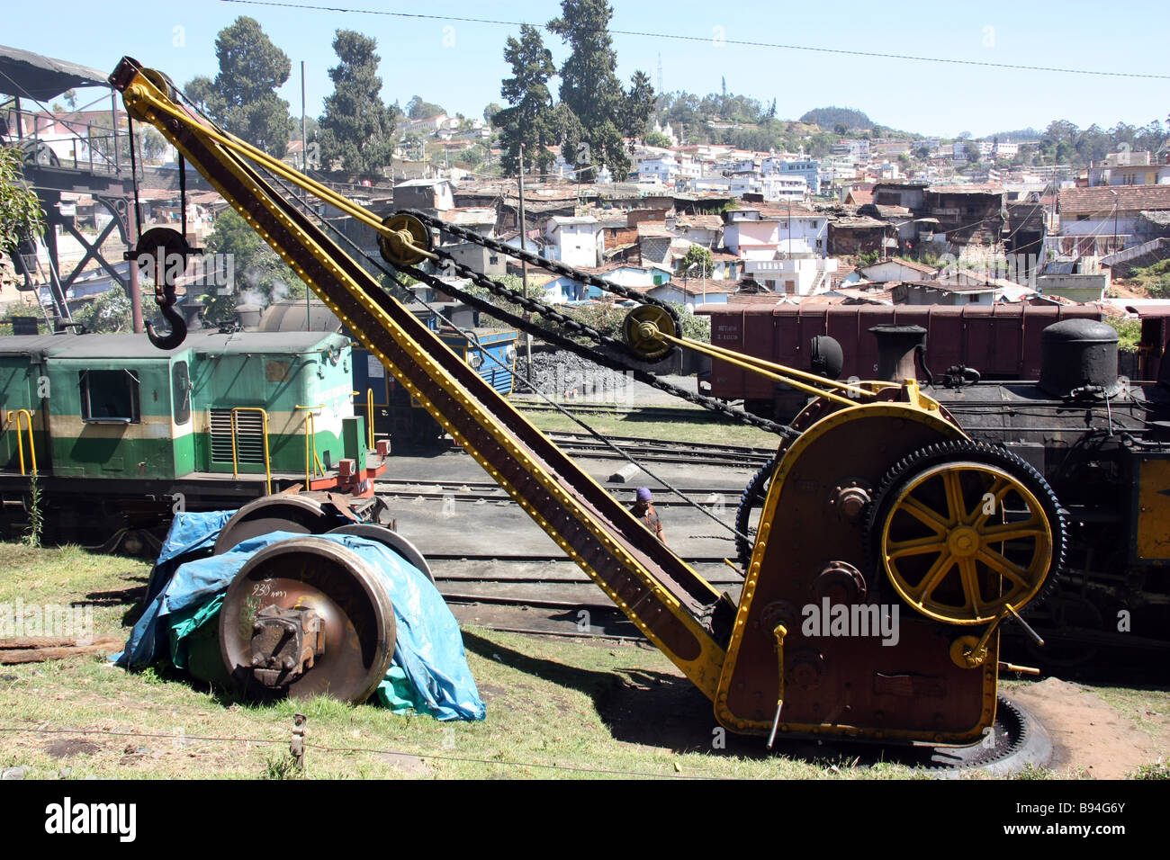 Steam powered locomotive under repair at Connor (Coonoor) Station, India Stock Photo
