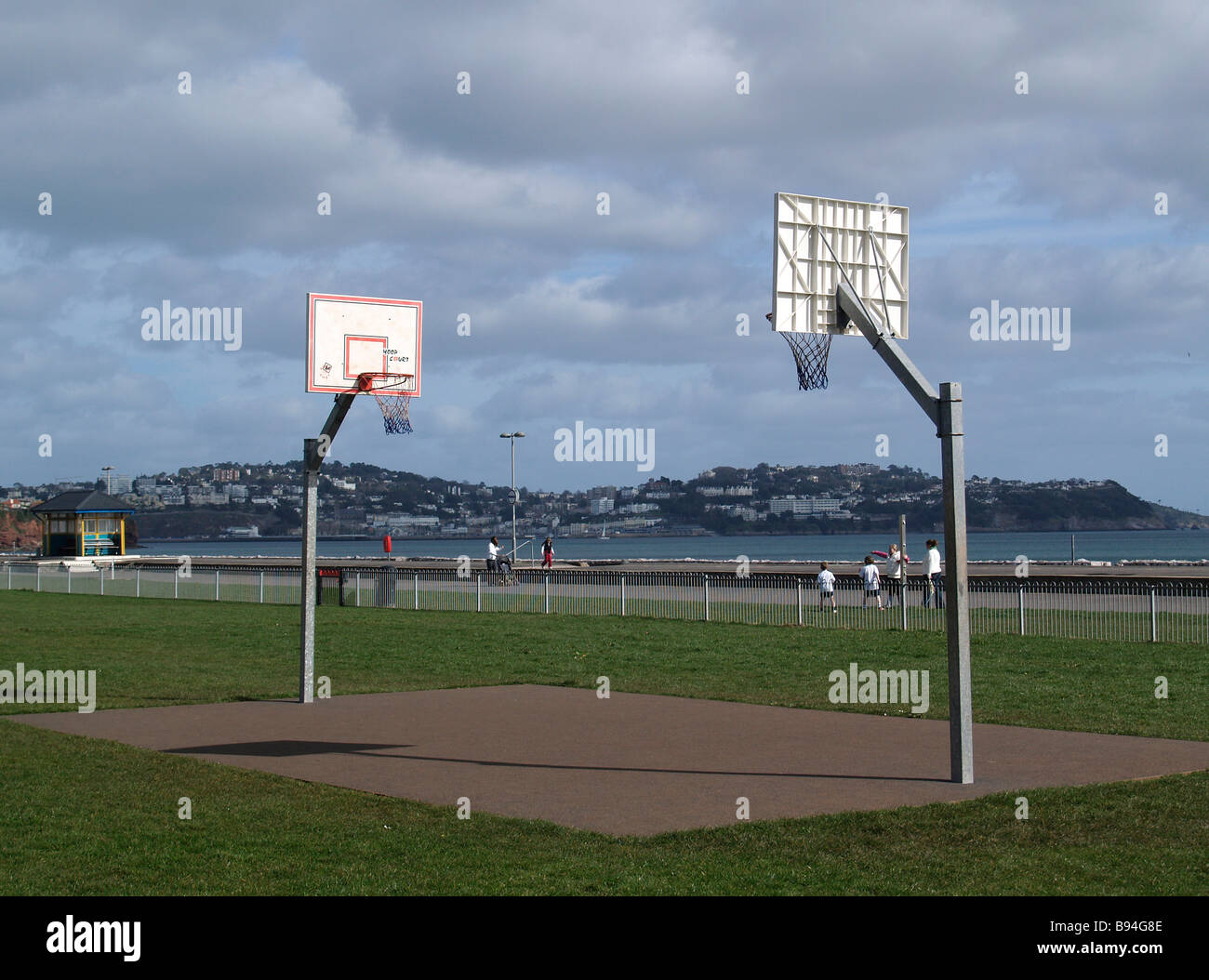 Basketball court on Preston Paignton seafront,with Torquay across the
