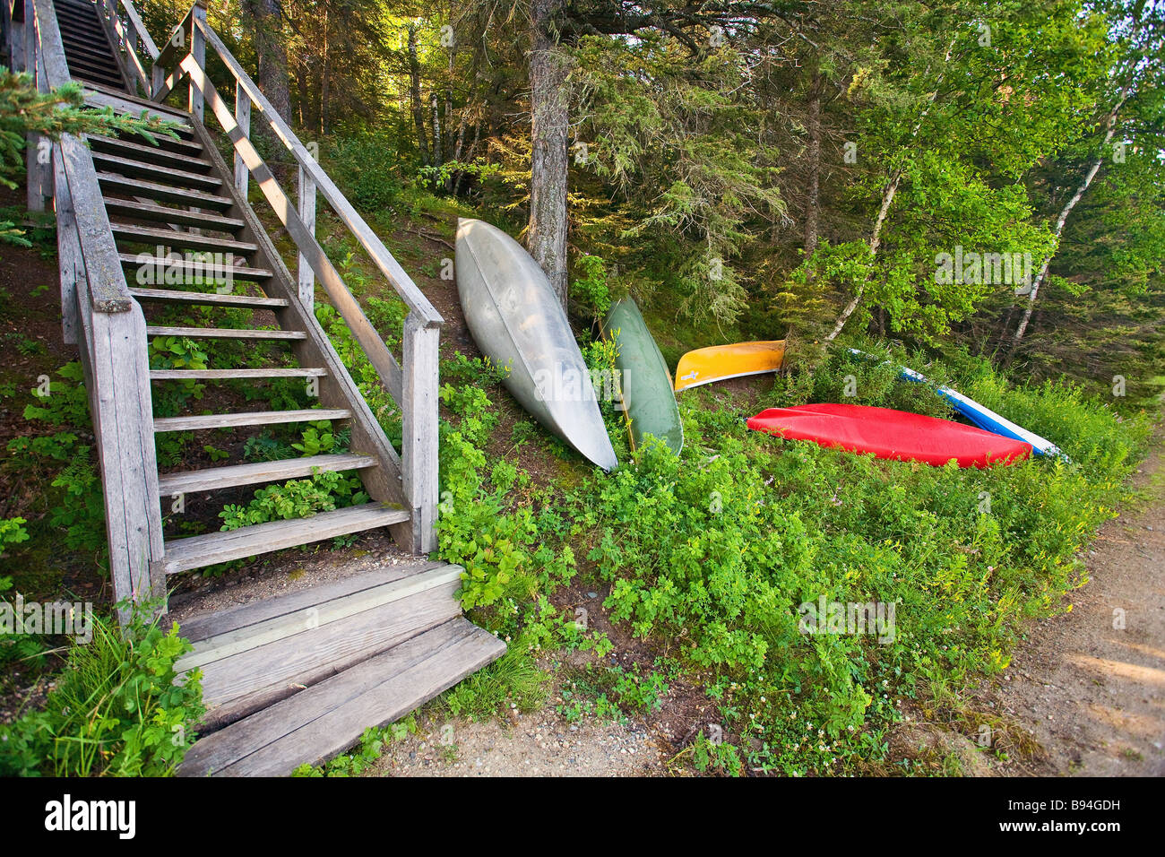 Canoes on shoreline, Clear Lake, Riding Mountain National Park, Manitoba, Canada Stock Photo