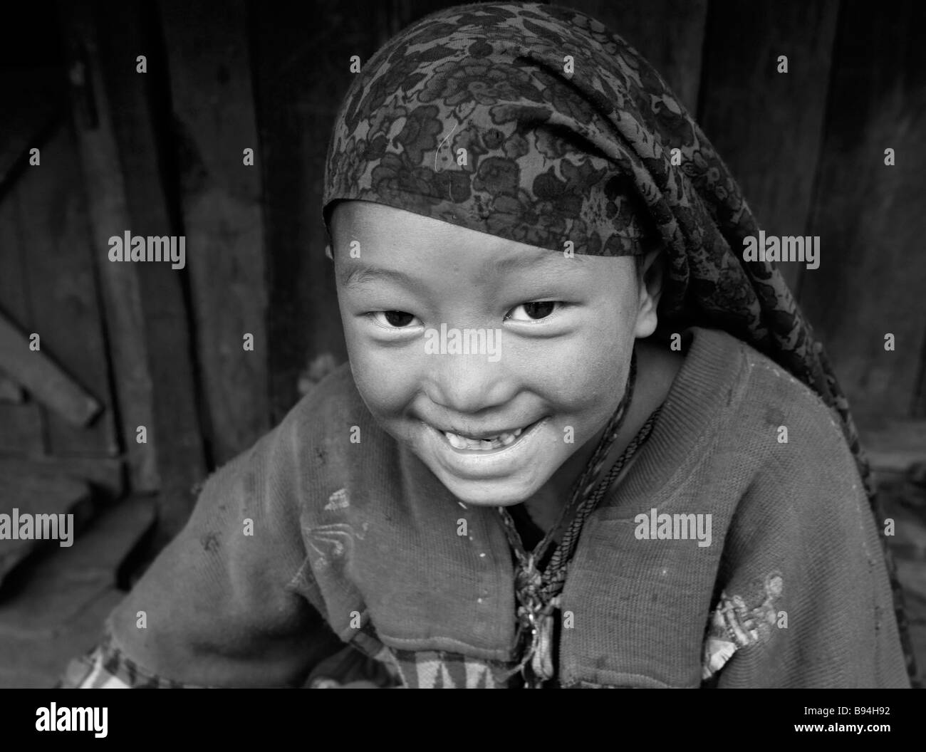 Annapurna Nepal 20 March 2008 Portrait of young Nepali girl smiling at trekkers on the trail Stock Photo