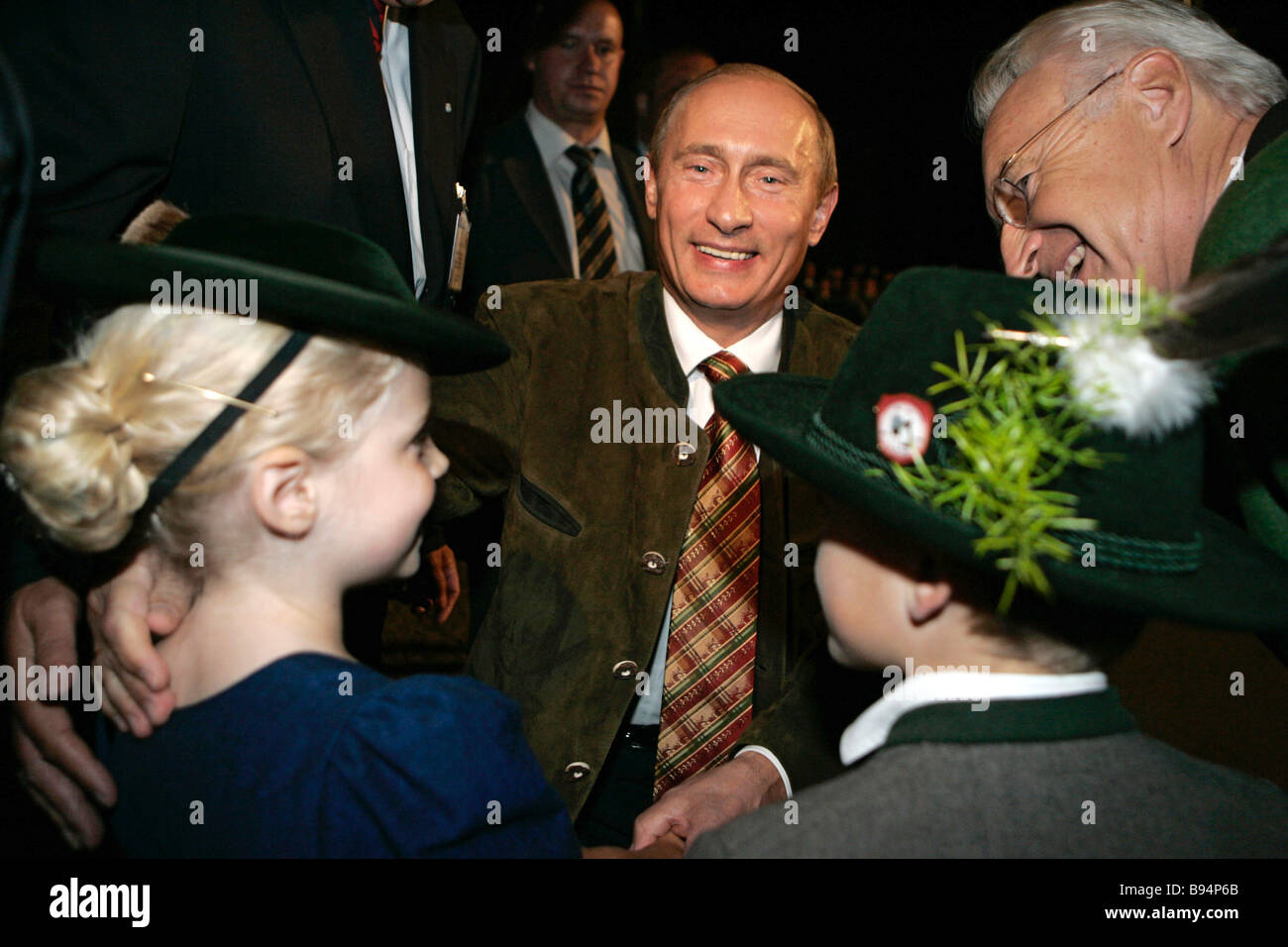 Russian President Vladimir Putin left and Dr Edmund Stoiber Bavarian Minister President right meet people of Aying before an Stock Photo