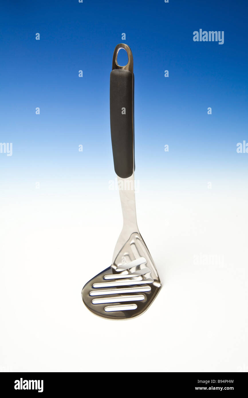 Potato masher Stainless steel utensil  Stock Photo