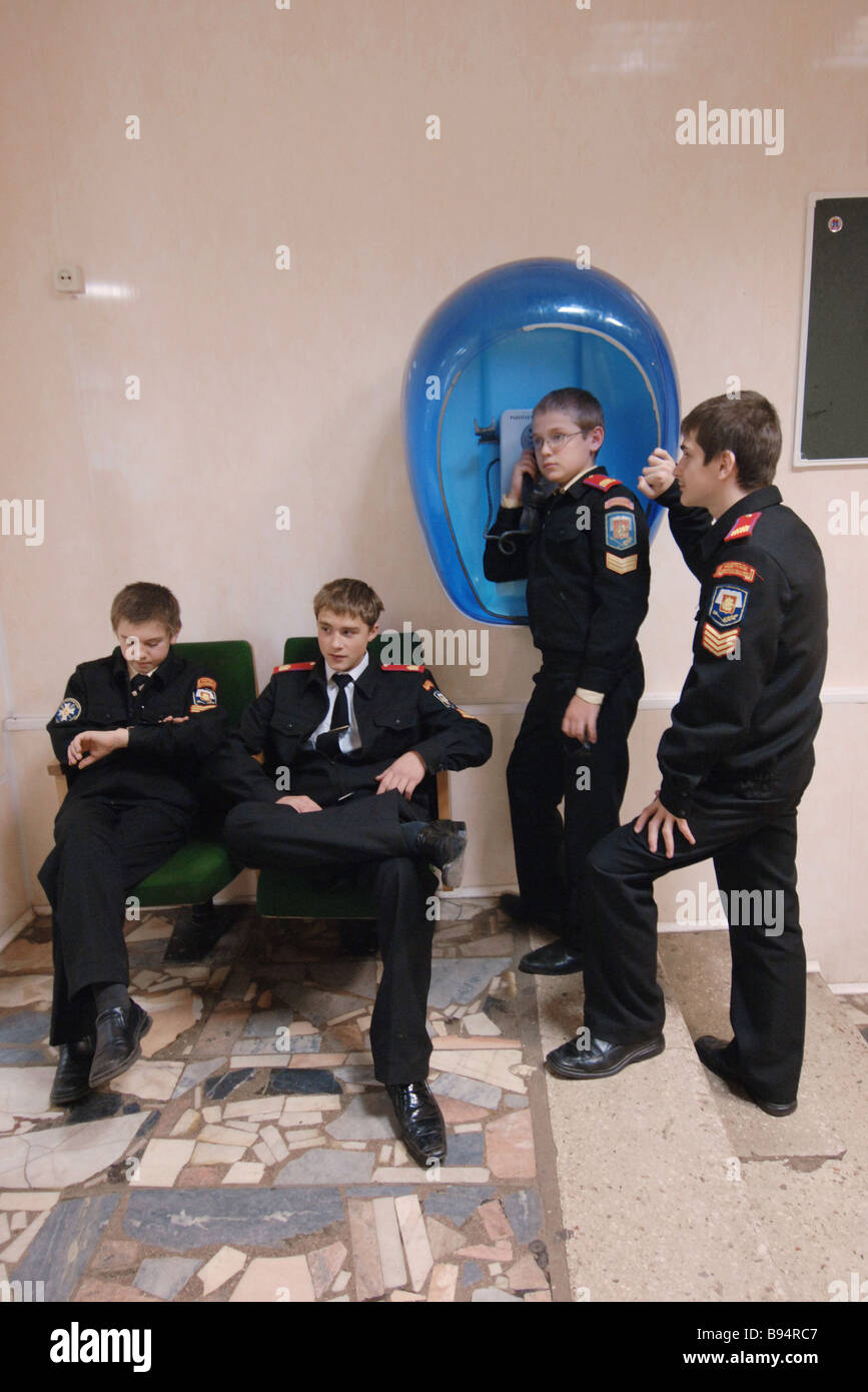 Moscow military cadets line the telephone queue in a break between the ...