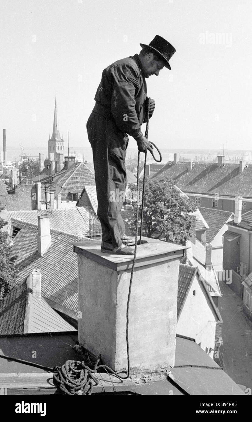 A chimney sweep working Stock Photo Alamy