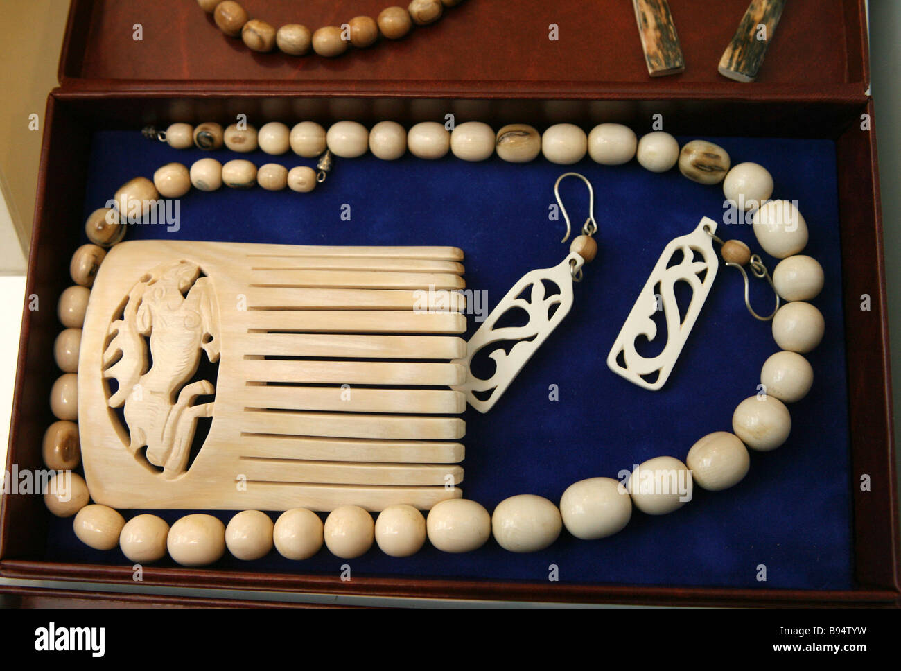 Mammoth bone jewelry by Nikolai Peristov from Omsk at the 6th All Russia exhibition Symbols of Motherland The All Russia Stock Photo