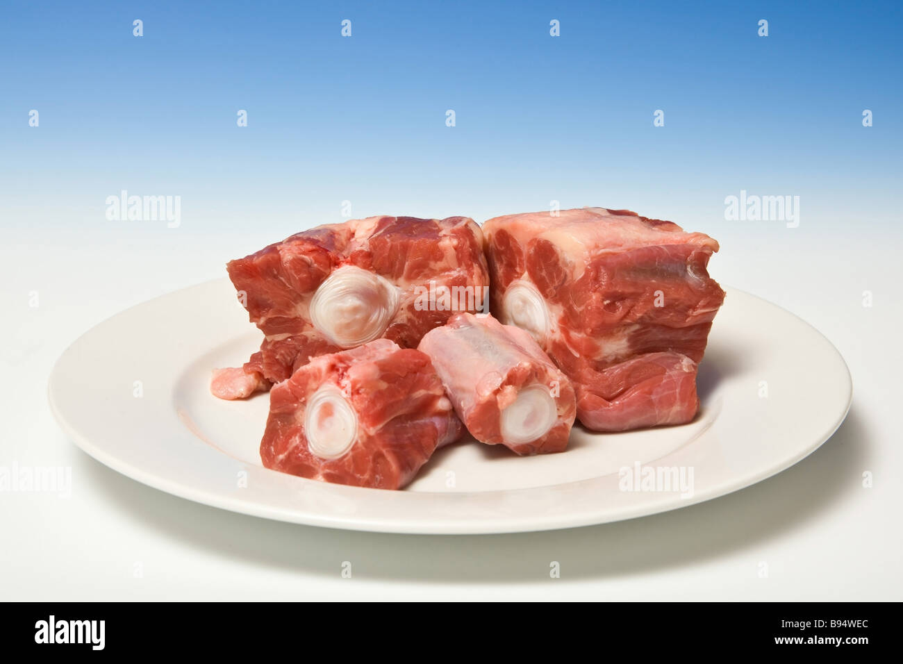 Ox tail meat (beef) uncooked Stock Photo - Alamy