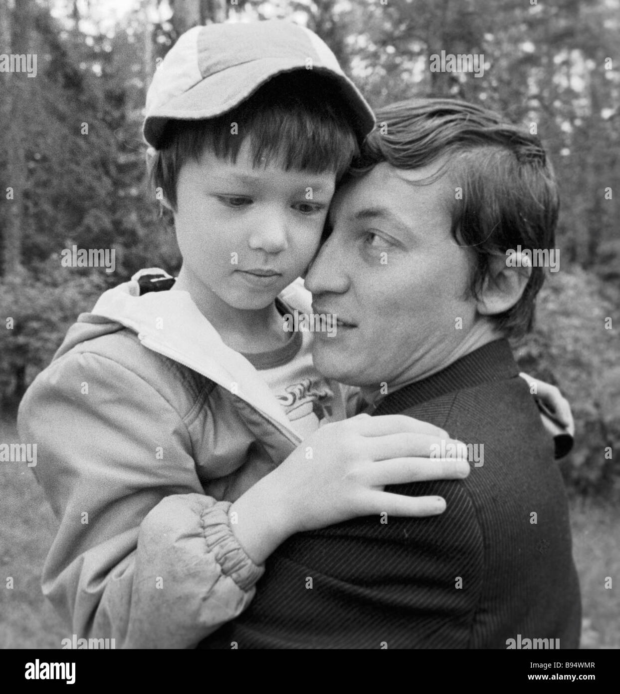 World chess champion Anatoly Karpov left with his wife Irina right and son  Anatoly center at home Stock Photo - Alamy