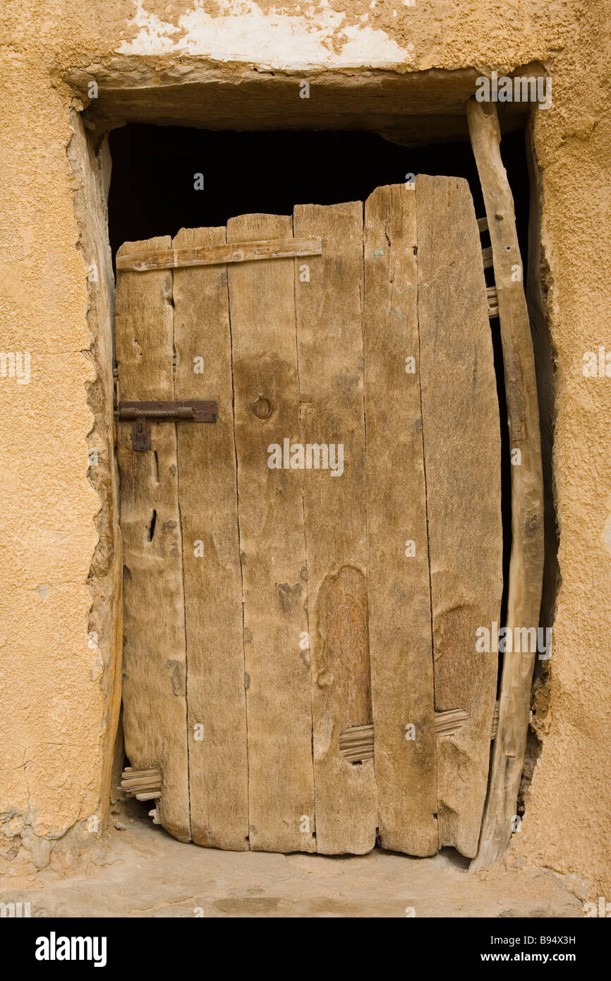 Ancient wooden doorway in Aghurmi Village, Siwa Oasis, Egypt Africa Stock Photo