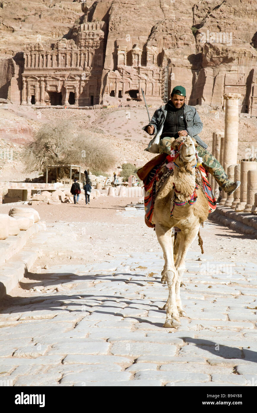 A local camel rider on the Collonaded street, Petra, Jordan Stock Photo