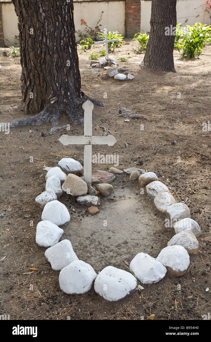 A grave and cross head piece, San Juan Capistrano Mission Stock Photo