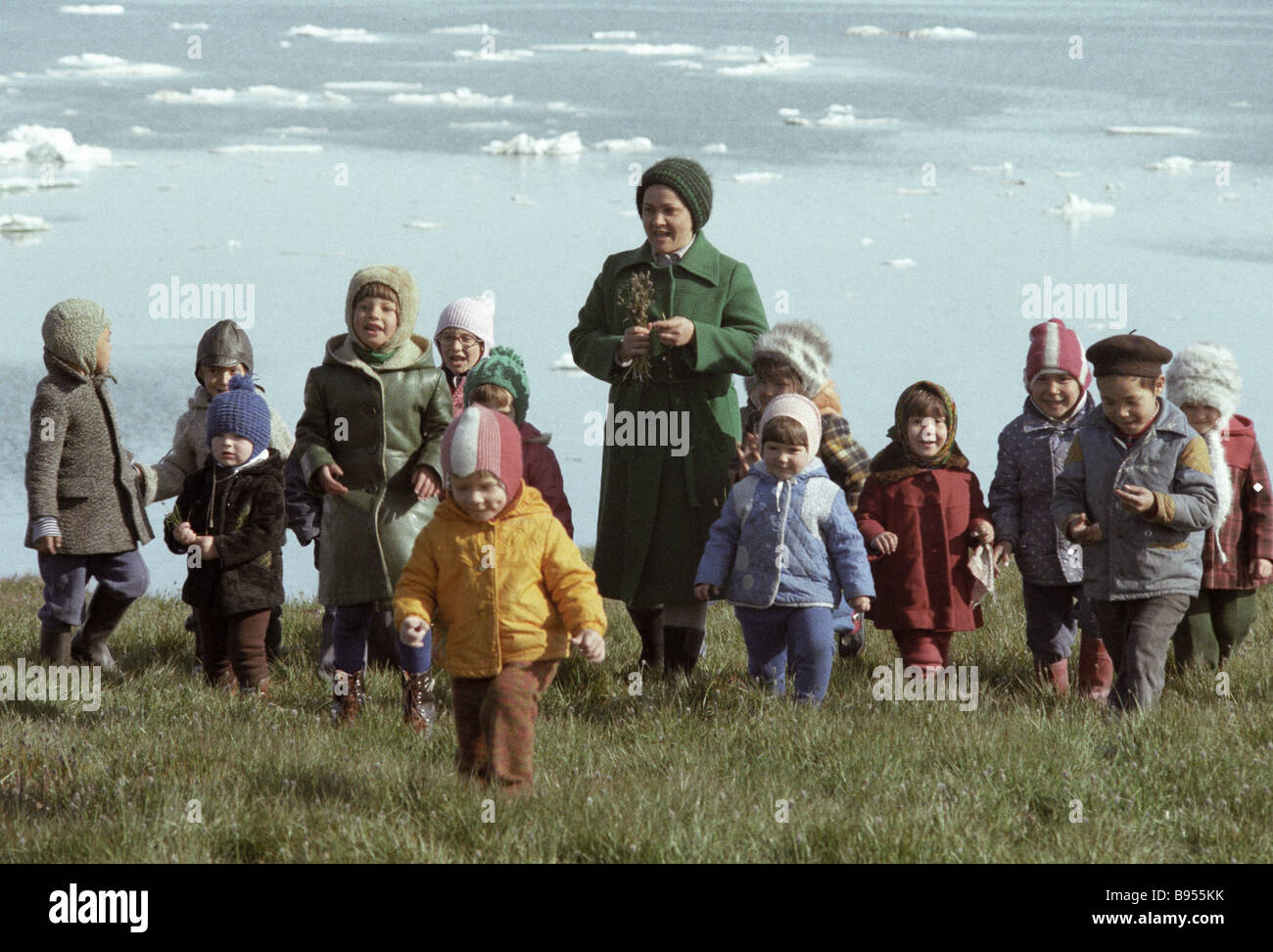 Children from a Chukotka kindergarten during a walk with their teacher ...