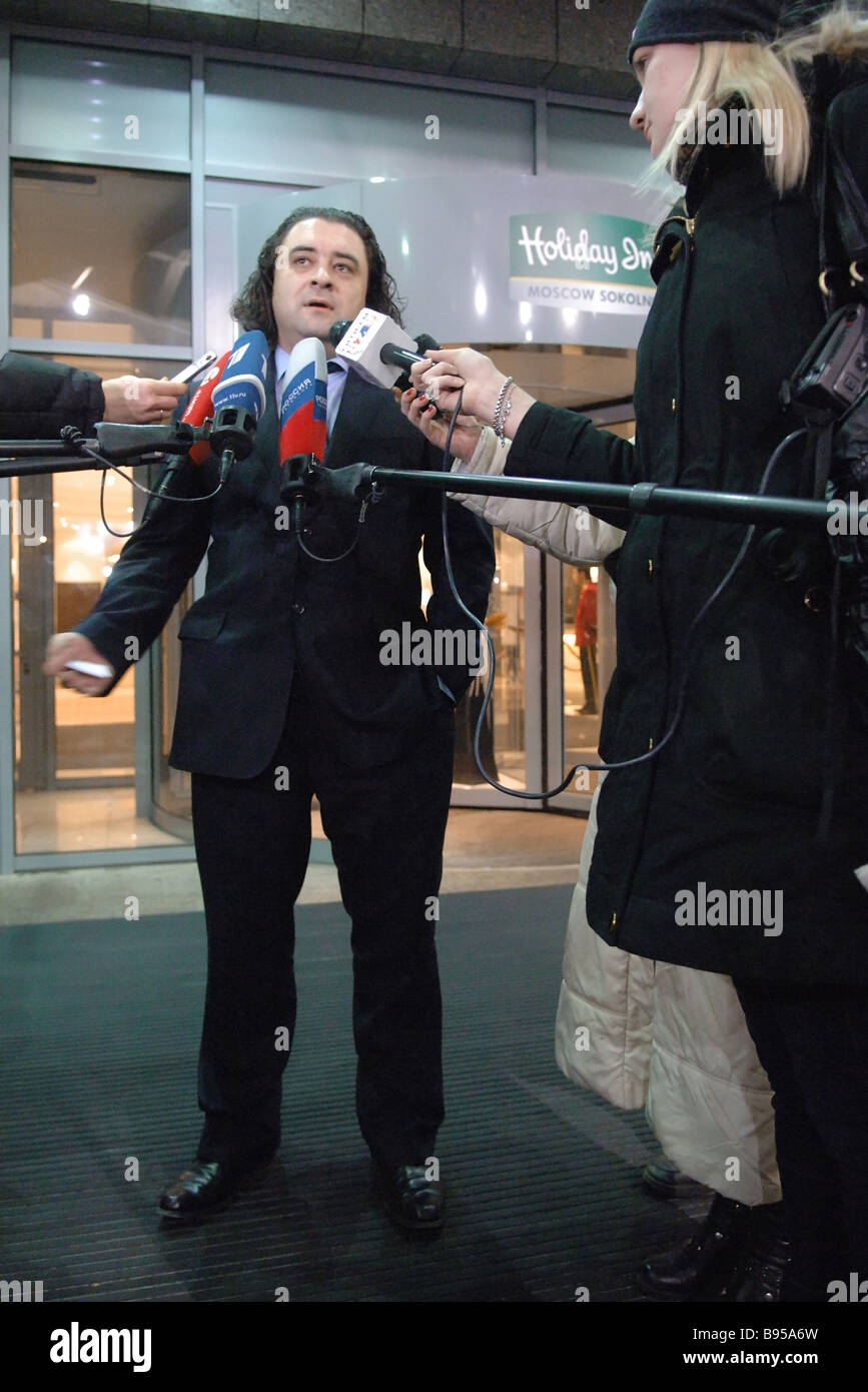 Russian presidential hopeful Andrei Bogdanov addressing journalists at