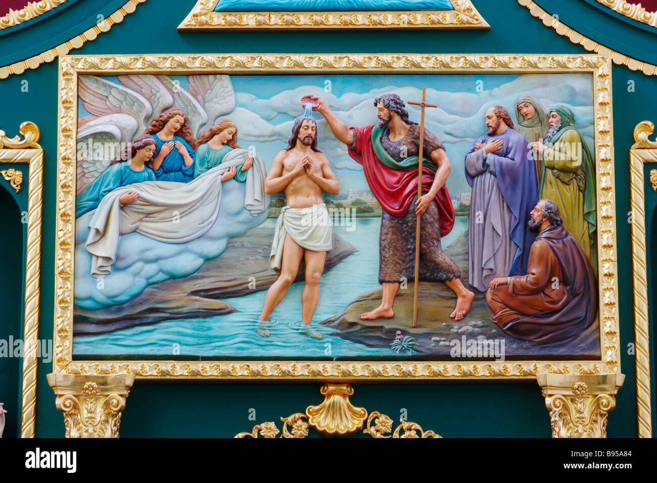 Relief in church in Spain depicting Jesus's baptism Stock Photo Alamy