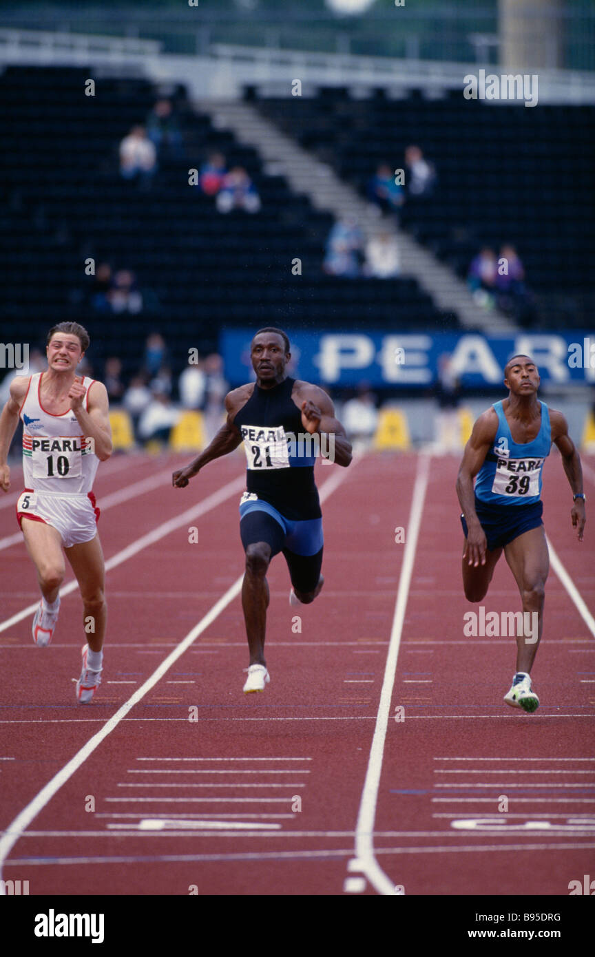 SPORT Athletics Track Linford Christie Colin Jackson and Toby Box running the 100 metres at Crystal Palace. Stock Photo