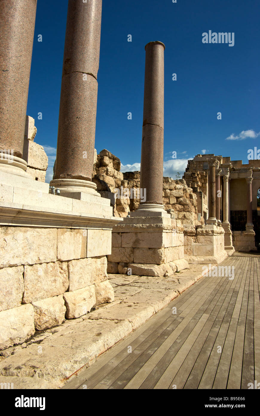 Granite support columns behind stage of 7000 seat theatre of Beth Shean best preserved ancient theater in Israel Stock Photo