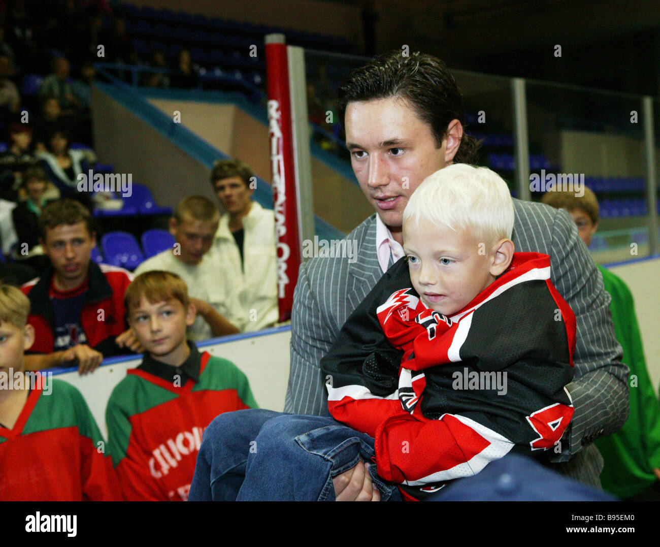 Hockey striker Ilya Kovalchuk of NHL meeting with young players from children s hockey school in Sports Palace Yubileiny in Tver Stock Photo