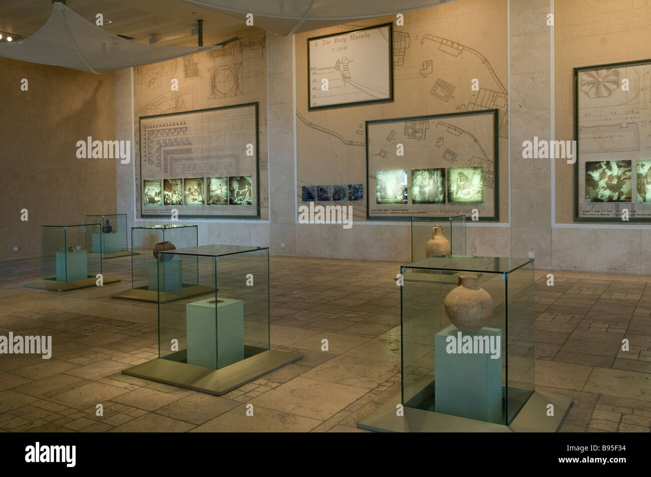 Ancient artifacts exhibited in the visitor hall in Masada ancient fortress on the eastern edge of the Judaean or Judean Desert in Israel Stock Photo