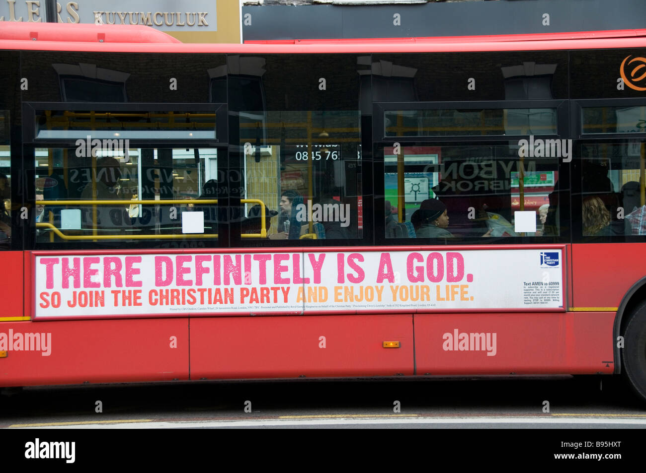 Bus with a sign from pro Christian group saying There definitely is a God Stock Photo