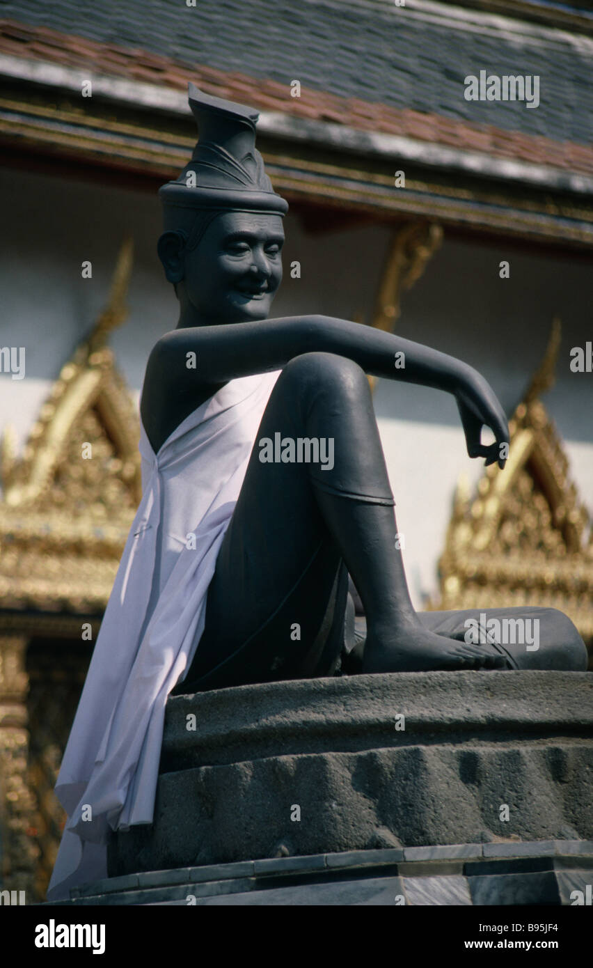 THAILAND Bangkok Grand Royal Palace Wat Phra Kaeo Temple Clay seated statue draped in white linen robe. Stock Photo