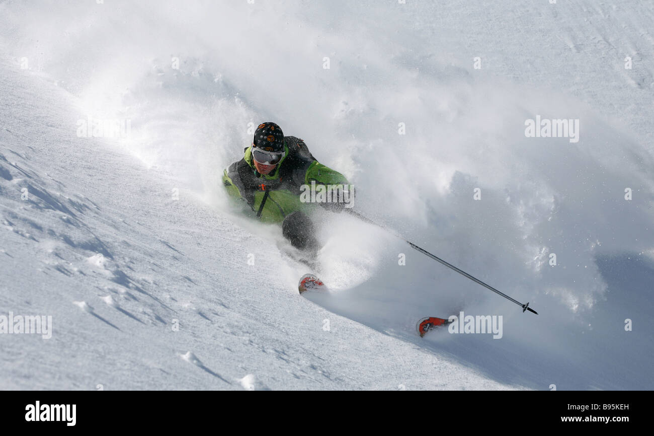 Extreme skier in deep powder snow Stock Photo